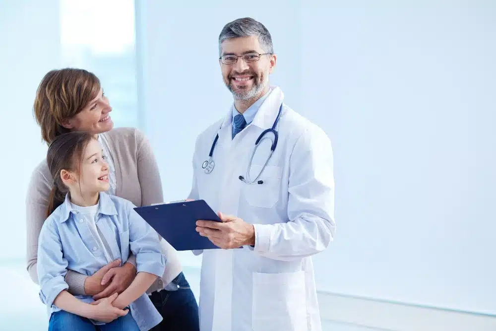 "A medical professional consulting with a patient in a healthcare facility